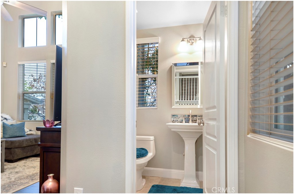 2 Hinterland Way Ladera Ranch, CA 92694 - Photo 14 of 29 a bathroom with a sink a mirror and a window