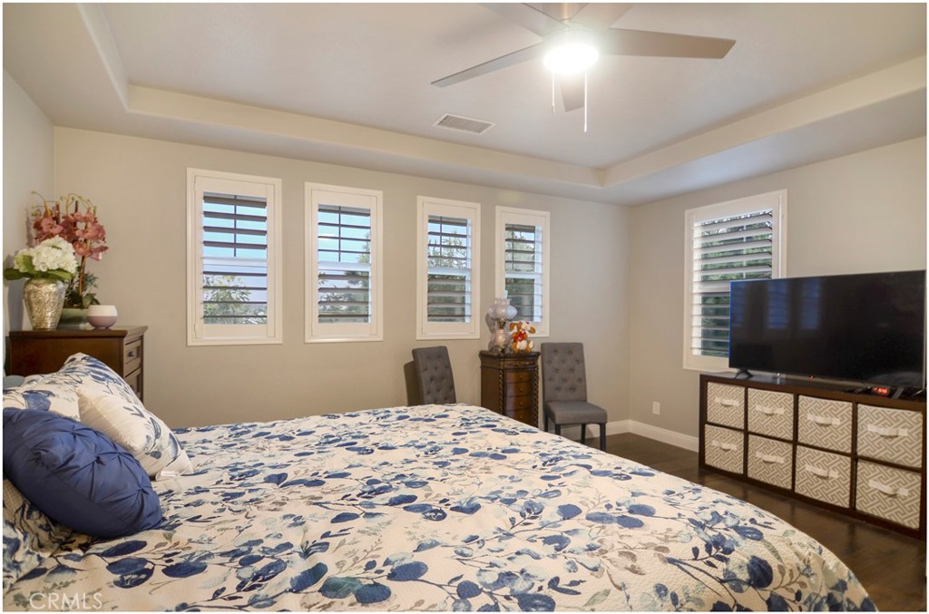 2 Hinterland Way Ladera Ranch, CA 92694 - Photo 18 of 29 a bedroom with a bed and a flat screen tv
