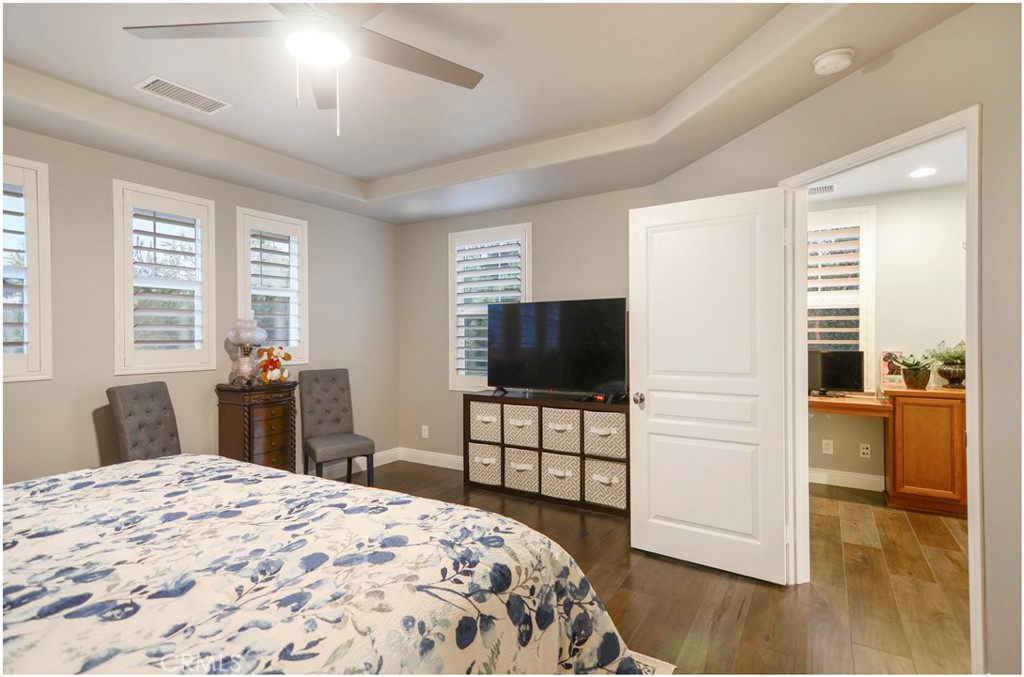 2 Hinterland Way Ladera Ranch, CA 92694 - Photo 19 of 29 a bedroom with a bed and a flat screen tv