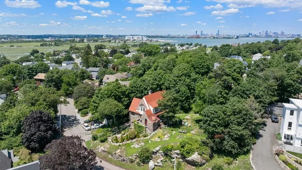 a view of a city with lots of trees