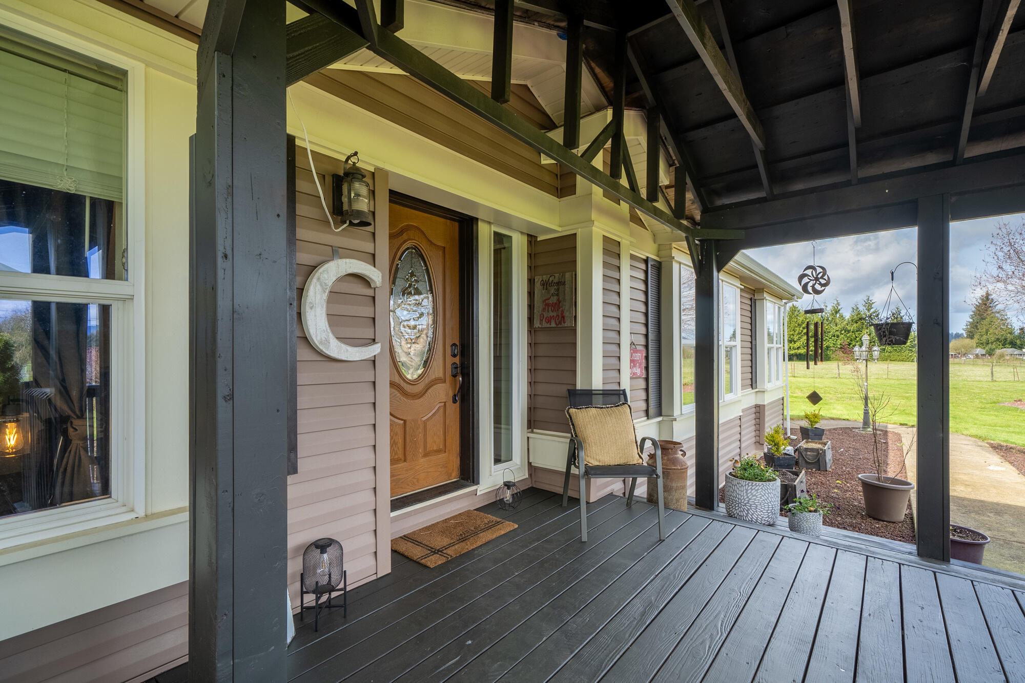 7400 South Prairie Road Tillamook, OR 97141 - Photo 5 of 62 a view of outdoor space with wooden floor and furniture