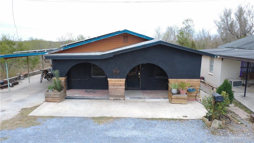 104 East Water Street Rio Grande City, TX 78582 - Photo 1 of 5 a front view of a house with a yard