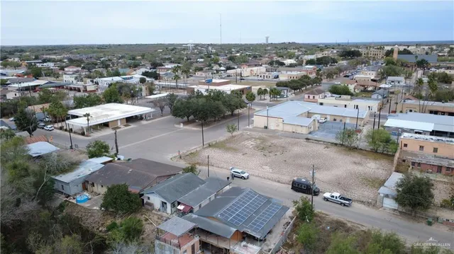 an aerial view of a city with lots of residential buildings