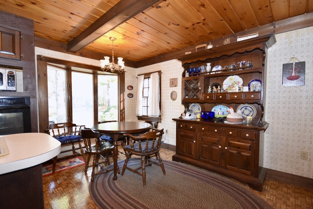 597 Delano Road Marion, MA 02738 - Photo 14 of 14 a view of a dining room with furniture window and outside view