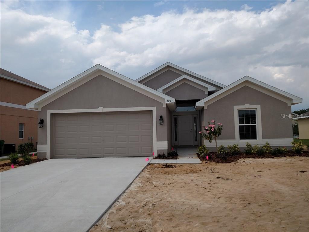 1271 Legatto Loop Dundee, FL 33838 - Photo 1 of 1 The 1635 4/2/2 just a couple weeks from completion