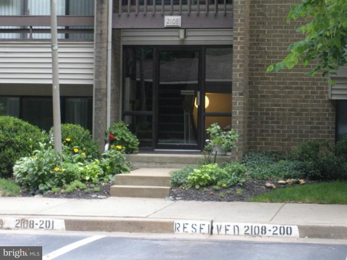 2108 Green Watch Way, Unit 11/200 Reston, VA 20191 - Photo 16 of 30 Assigned parking space in front of building