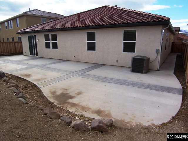 11410 Cervino Drive Reno, NV 89521 - Photo 13 of 13 a view of a house with a backyard