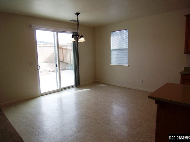 11410 Cervino Drive Reno, NV 89521 - Photo 4 of 13 a view of an empty room with a window