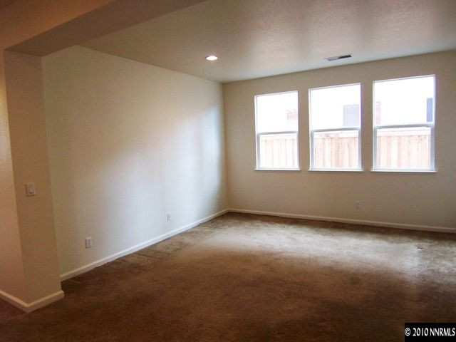 11410 Cervino Drive Reno, NV 89521 - Photo 5 of 13 an empty room with a window