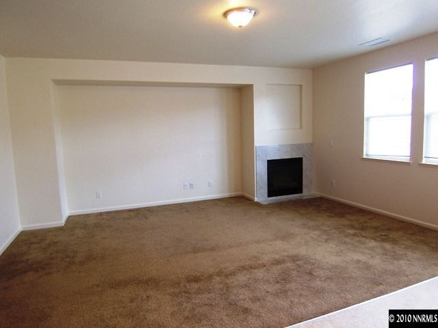 11410 Cervino Drive Reno, NV 89521 - Photo 6 of 13 a view of an empty room with a window