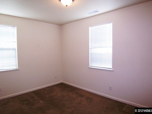11410 Cervino Drive Reno, NV 89521 - Photo 9 of 13 an empty room with a window