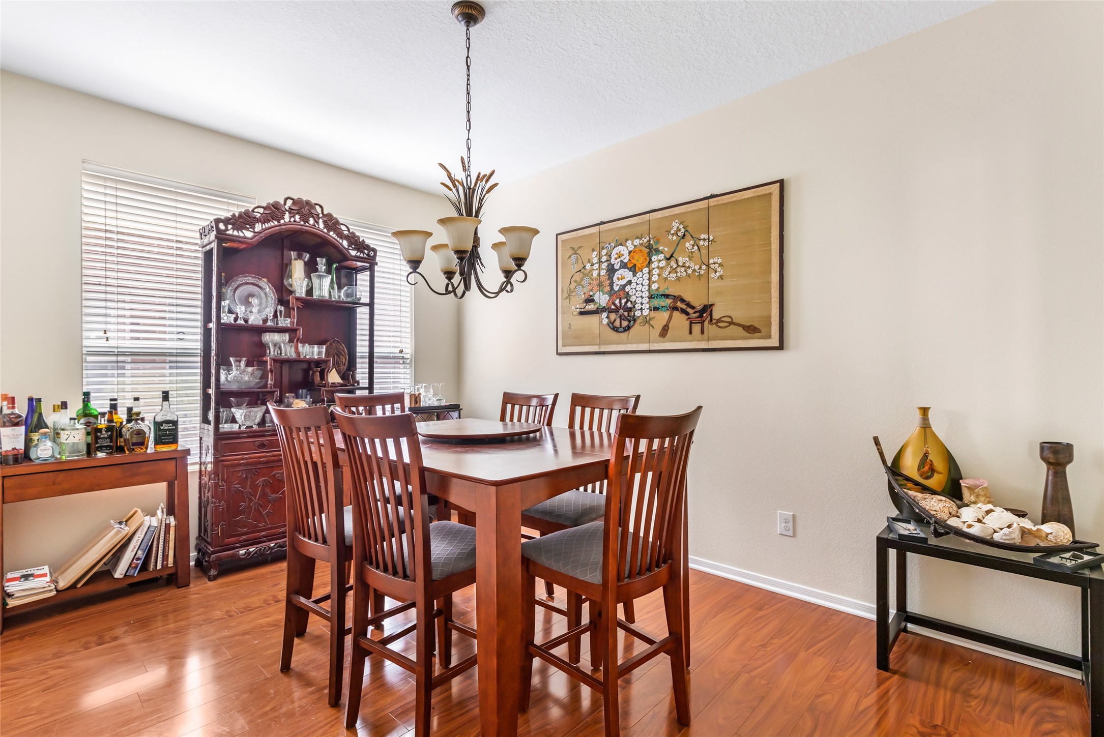 12122 Landsdown Ridge Way Humble, TX 77346 - Photo 17 of 34 a view of a dining room with furniture window and wooden floor