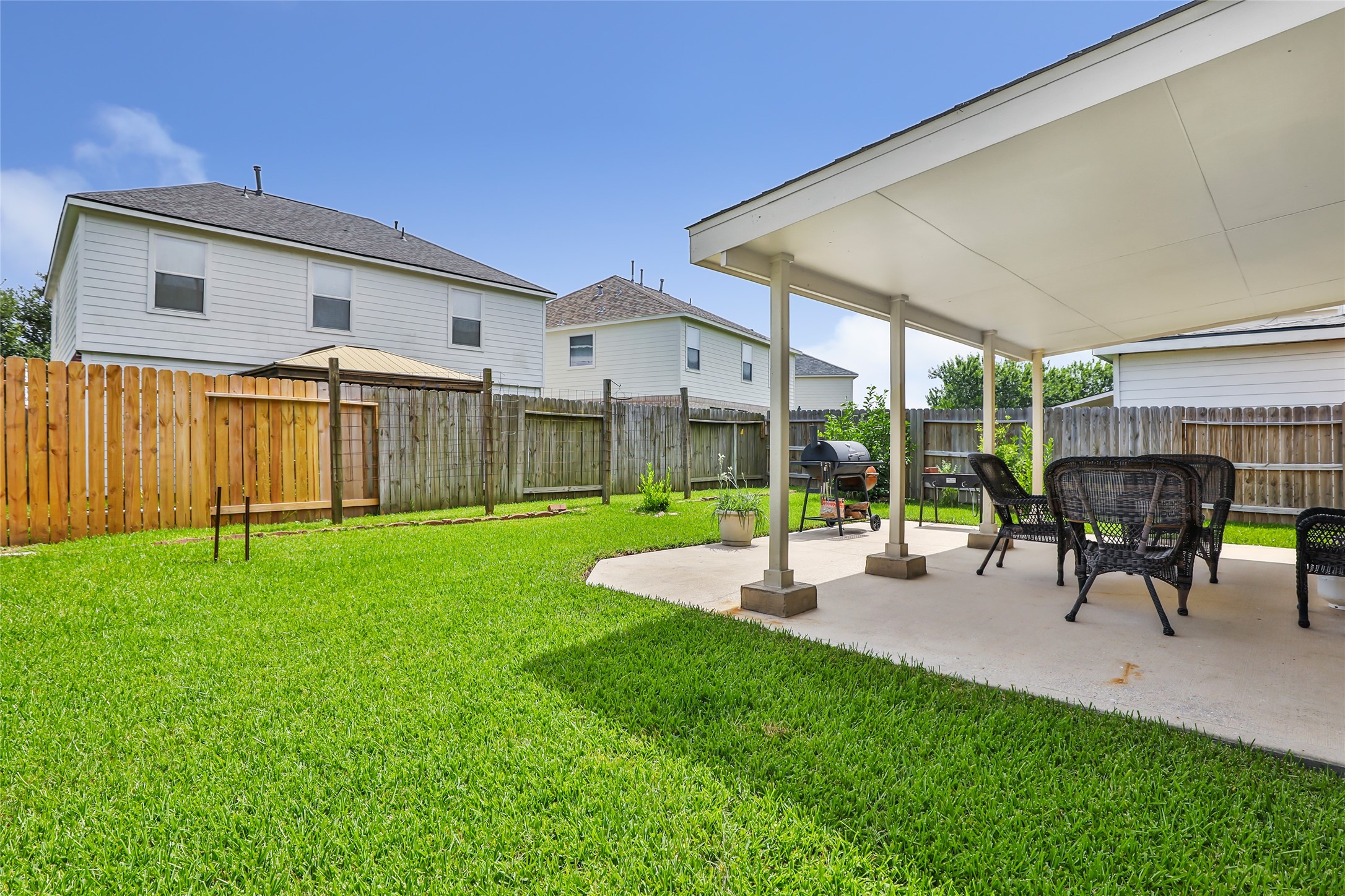 12122 Landsdown Ridge Way Humble, TX 77346 - Photo 6 of 34 a view of a house with backyard porch and sitting area