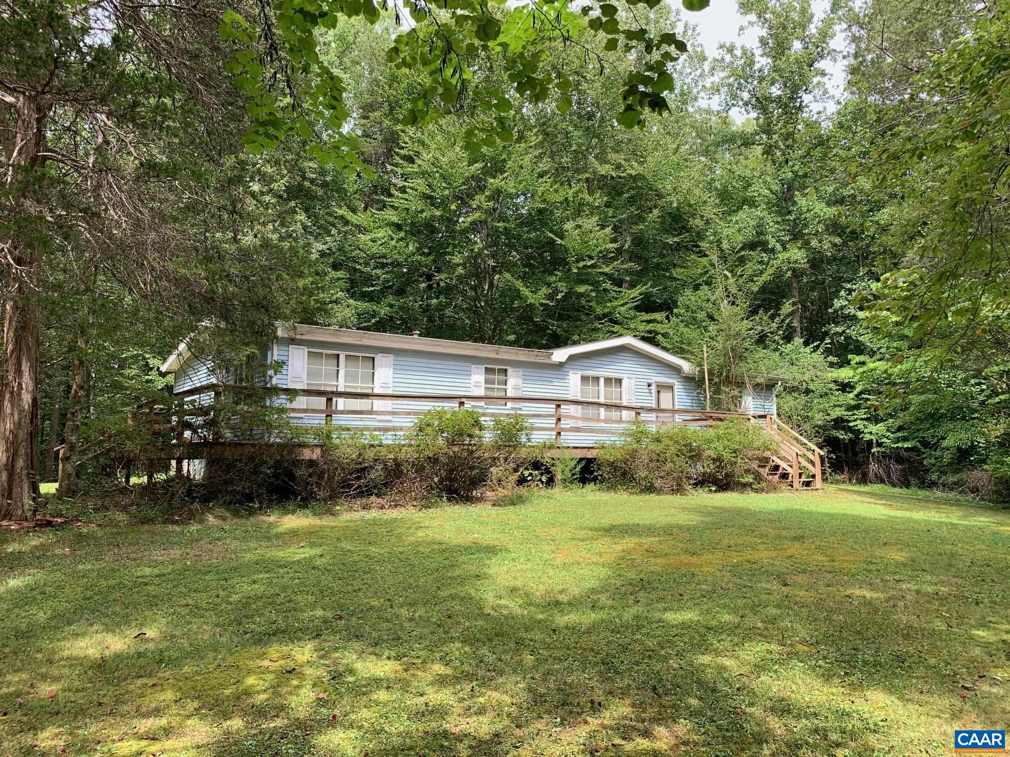 3981 South Blue Ridge Turnpike Rochelle, VA 22738 - Photo 7 of 15 a front view of house with yard and green space