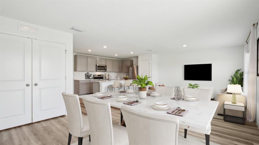 35353 Vly Rdg Road Dade City, FL 33525 - Photo 4 of 14 a kitchen with a white table and chairs in it
