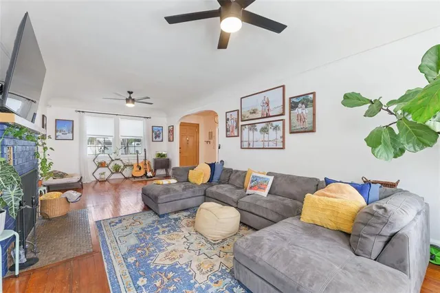 a living room with furniture or couch and a flat screen tv