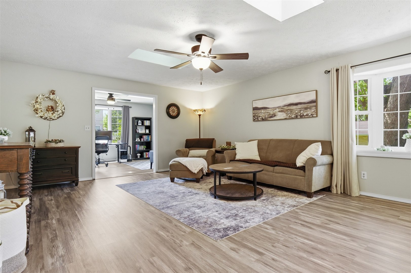 501 Augustine Way Normal, IL 61761 - Photo 13 of 43 a living room with furniture and wooden floor