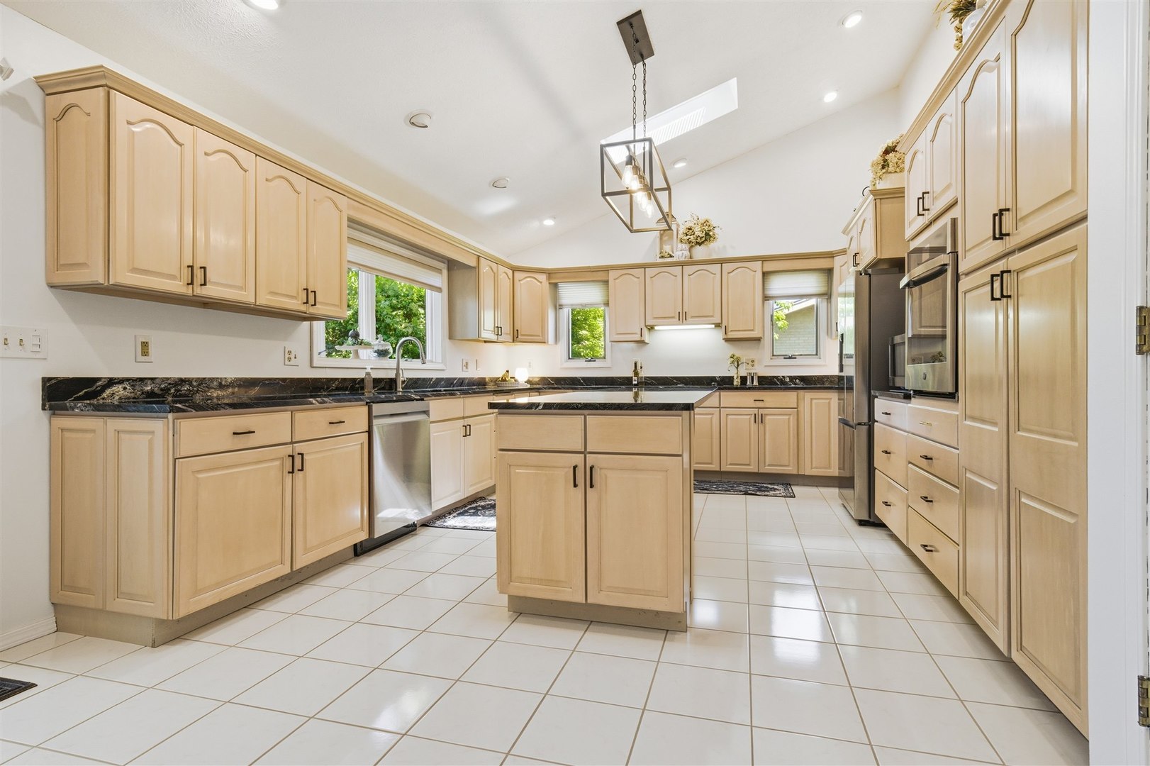 501 Augustine Way Normal, IL 61761 - Photo 19 of 43 a large kitchen with cabinets