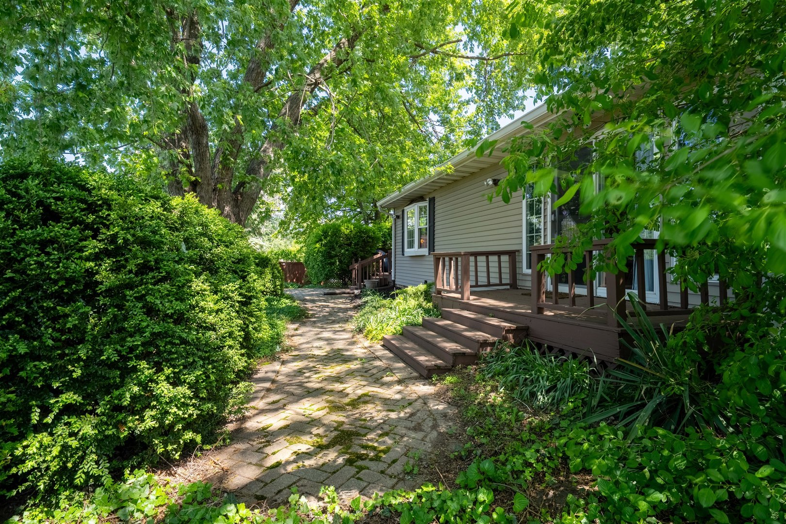 501 Augustine Way Normal, IL 61761 - Photo 42 of 43 a backyard of a house with seating space