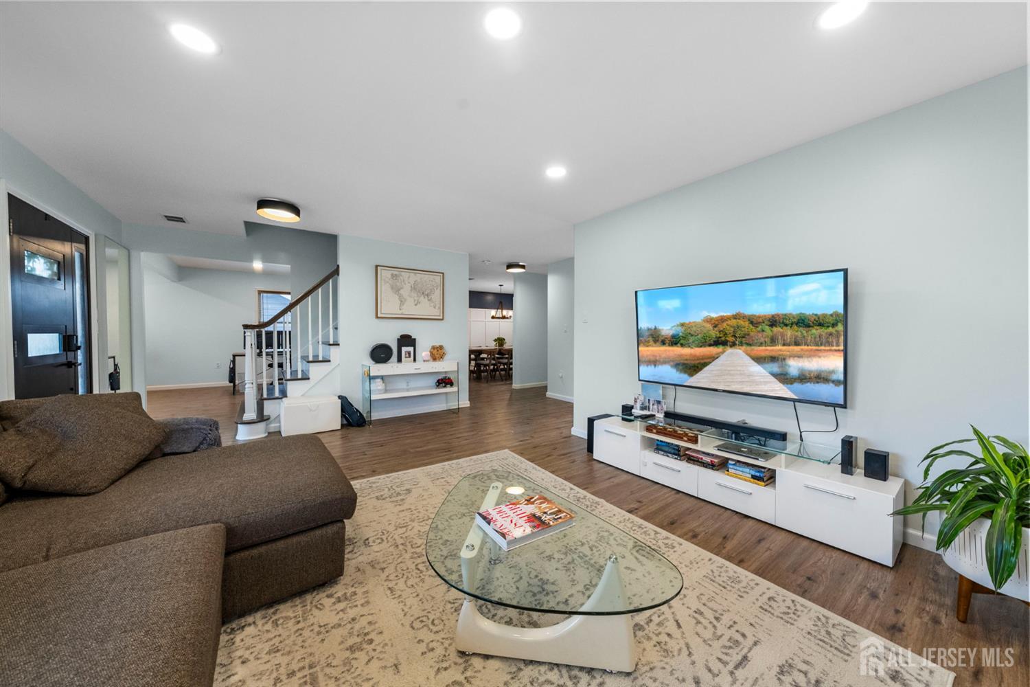 243 Alpine Way Old Bridge, NJ 08879 - Photo 12 of 45 a living room with furniture and a flat screen tv