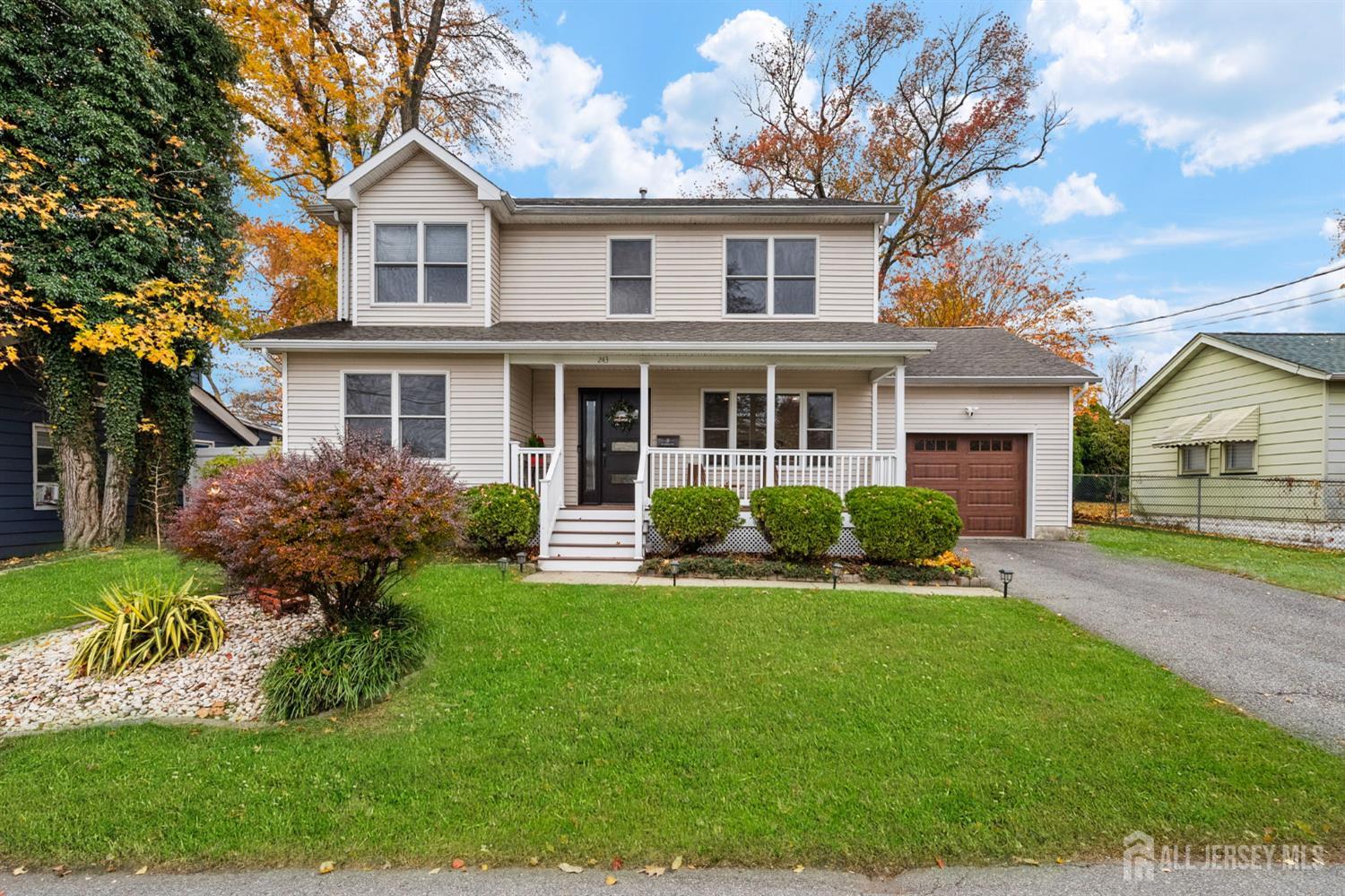 243 Alpine Way Old Bridge, NJ 08879 - Photo 2 of 45 a front view of a house with a yard