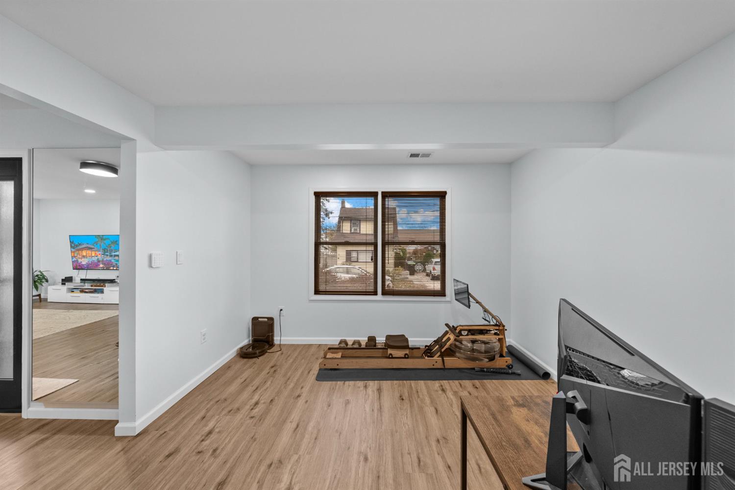 243 Alpine Way Old Bridge, NJ 08879 - Photo 22 of 45 a view of a room with gym equipment