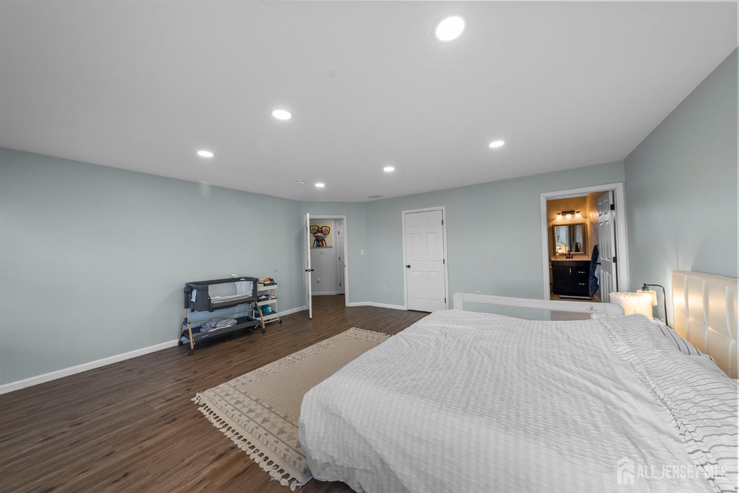 243 Alpine Way Old Bridge, NJ 08879 - Photo 28 of 45 a bedroom with a bed and a couch