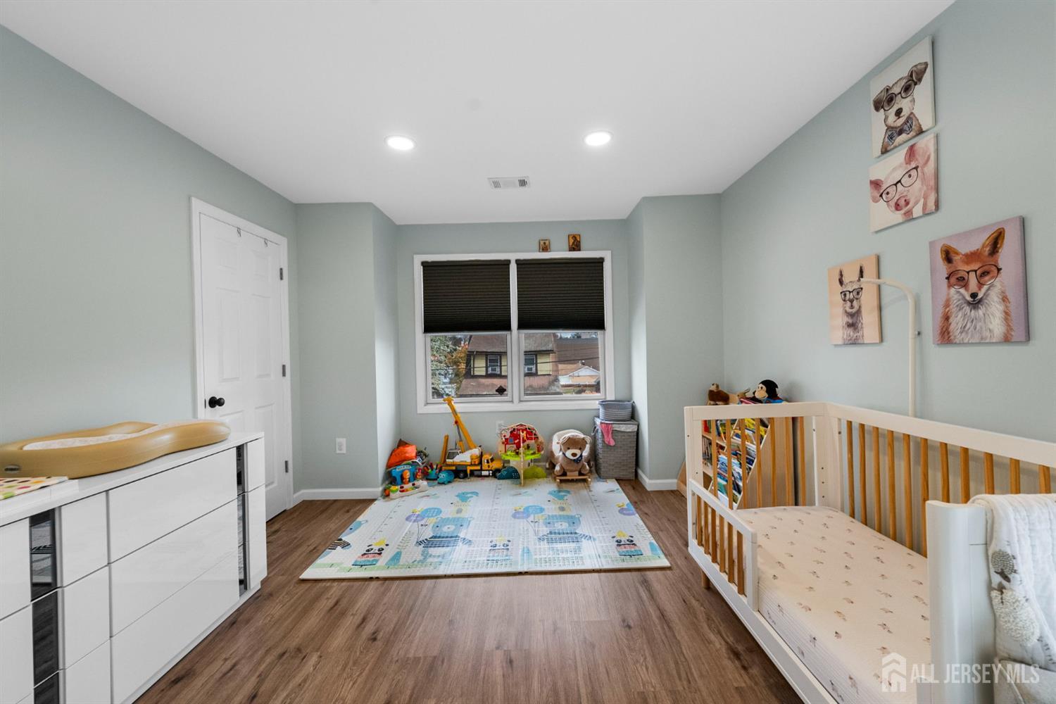243 Alpine Way Old Bridge, NJ 08879 - Photo 33 of 45 a living room with furniture and a flat screen tv
