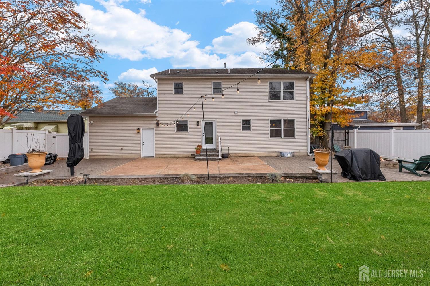 243 Alpine Way Old Bridge, NJ 08879 - Photo 37 of 45 a view of a house with backyard and a tree