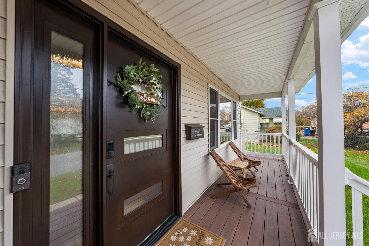243 Alpine Way Old Bridge, NJ 08879 - Photo 6 of 45 a balcony with chairs