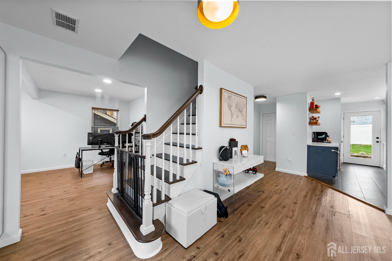 243 Alpine Way Old Bridge, NJ 08879 - Photo 9 of 45 a view of a room with wooden floor and stairs