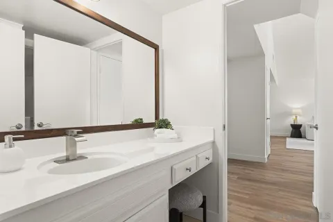 a bed room with a bed and a large window