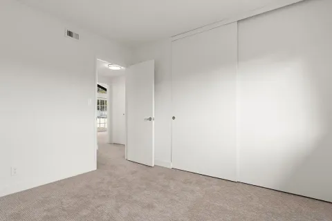 a view of a house with a large window