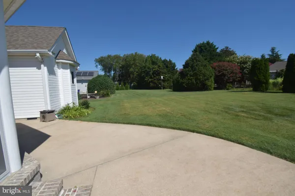a view of backyard with green space
