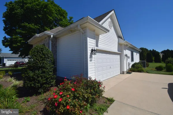a front view of house with a yard