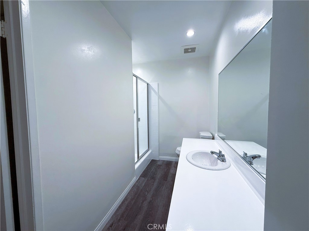 525 Fischer Street, Unit 1 Glendale, CA 91205 - Photo 12 of 25 a bathroom with a sink and a mirror