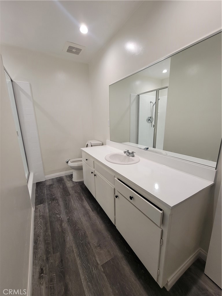 525 Fischer Street, Unit 1 Glendale, CA 91205 - Photo 21 of 25 a room with a sink and a mirror