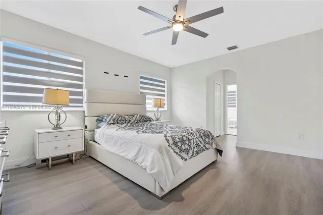 an aerial view of a house with swimming pool