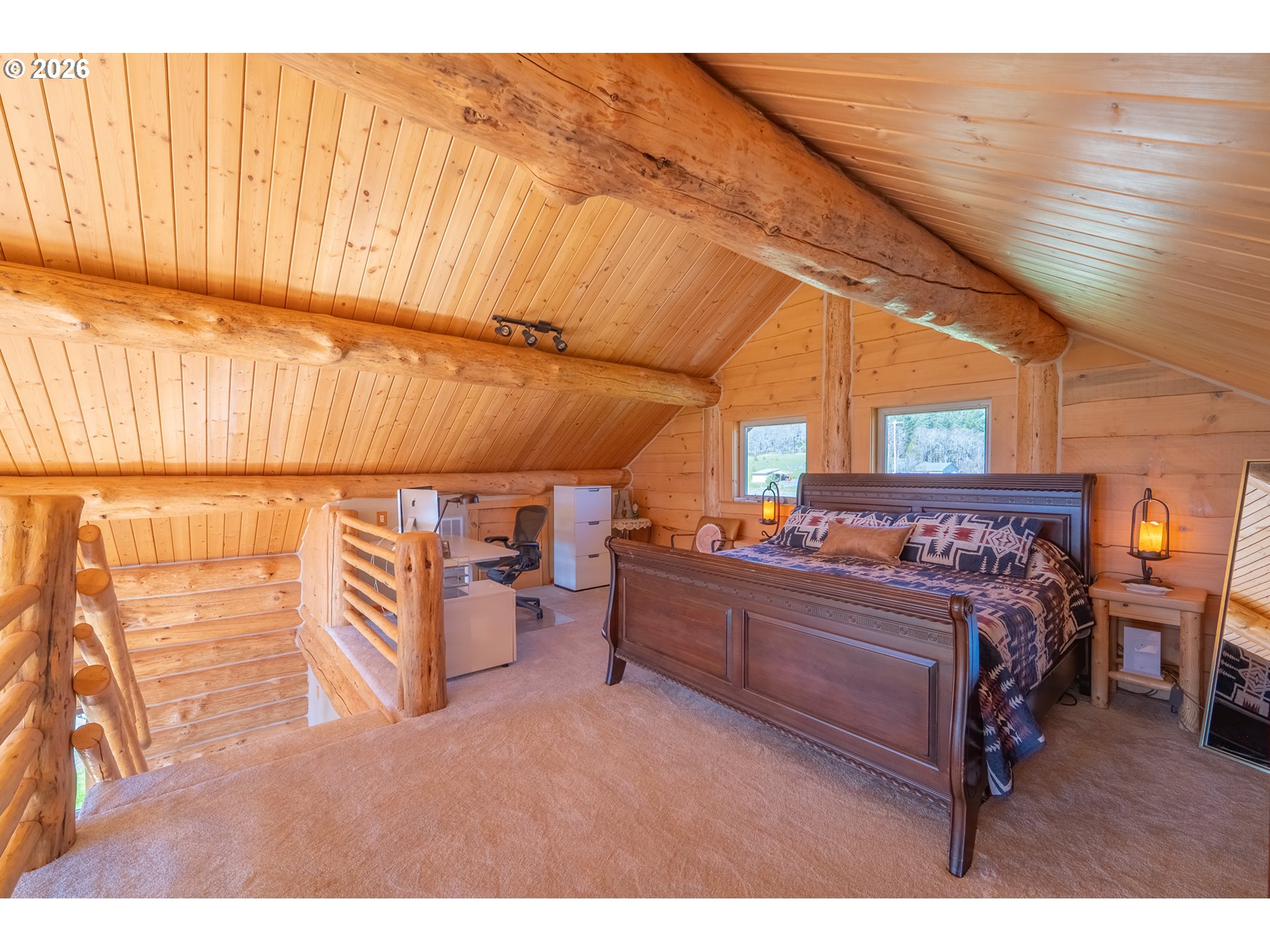 6 Justin Road Lyle, WA 98635 - Photo 16 of 46 a bed room with a bed and a chair