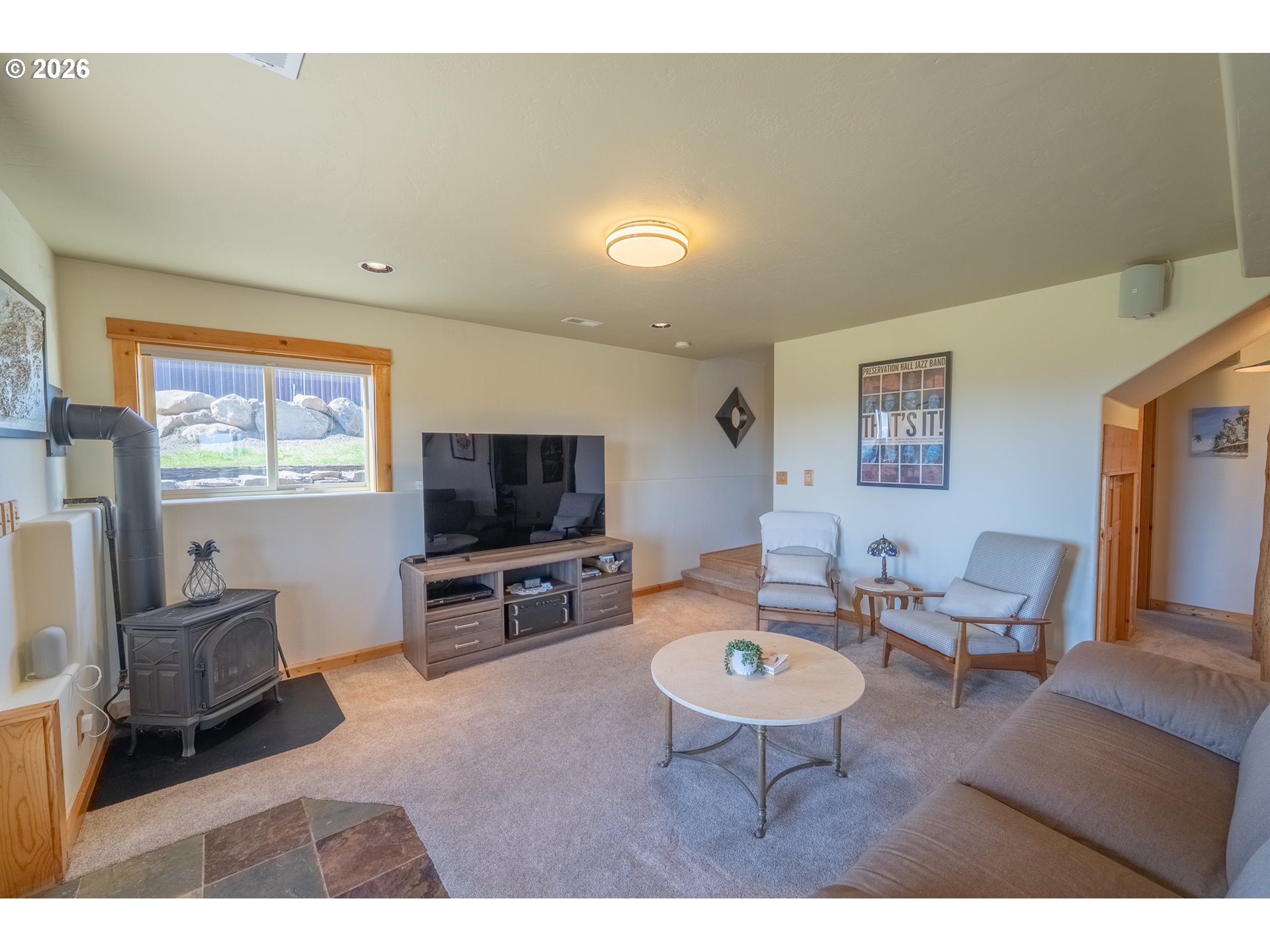 6 Justin Road Lyle, WA 98635 - Photo 29 of 46 a living room with furniture and a flat screen tv