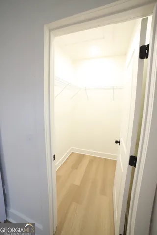 a kitchen with a sink cabinets and window