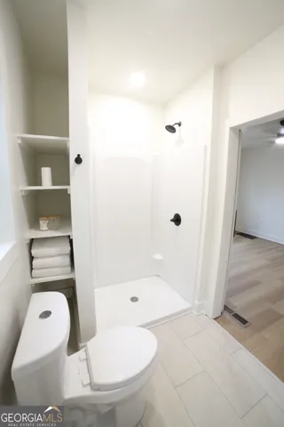 a kitchen with a stove and a microwave