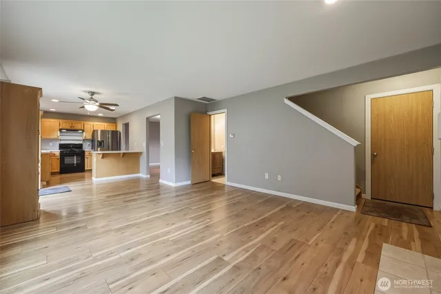 a view of a livingroom with wooden floor