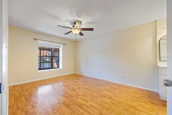 a view of an empty room with a window