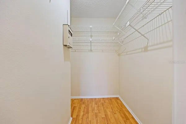 a view of a room with racks on the wall
