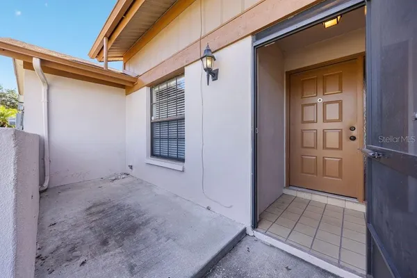 a view of front door and utility room