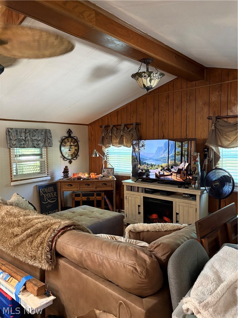 8701 Mayfield Road, Unit 148 Chesterland, OH 44026 - Photo 5 of 24 Slanted ceiling with exposed wood beams