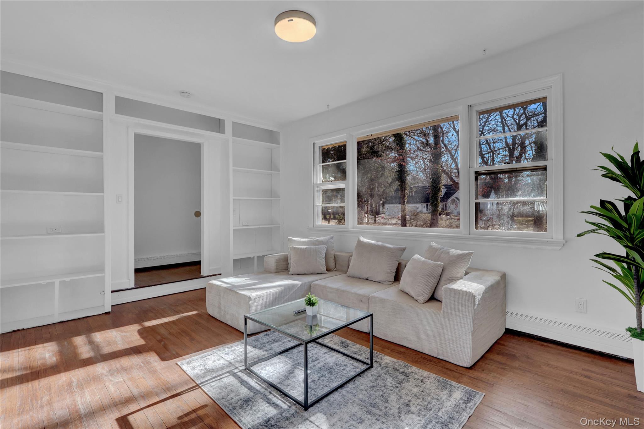57 Middle Island Road Medford, NY 11763 - Photo 5 of 28 a living room with furniture and large window