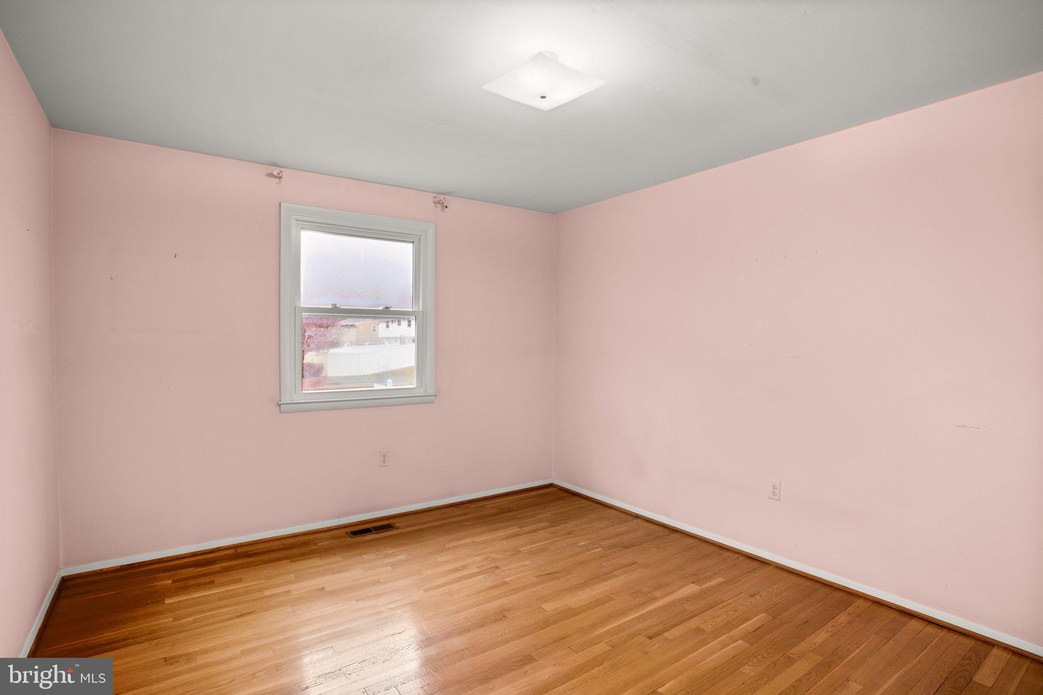 3923 Zurich Road Randallstown, MD 21133 - Photo 17 of 30 Bedroom Three w/ Wood Floors