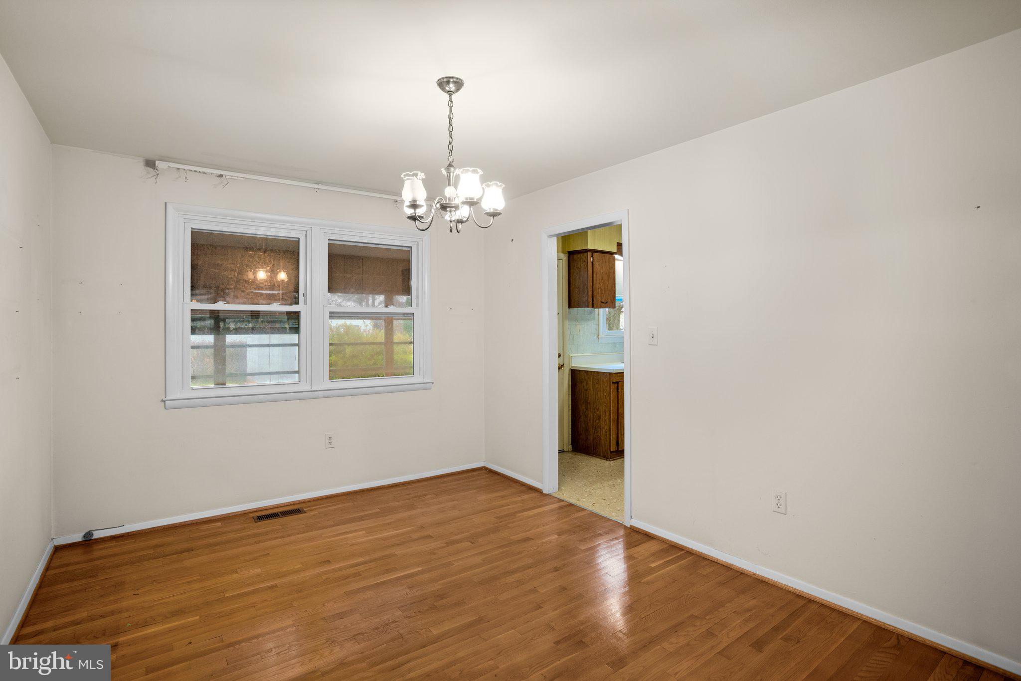3923 Zurich Road Randallstown, MD 21133 - Photo 5 of 30 Dining Room w/ Wood Floors